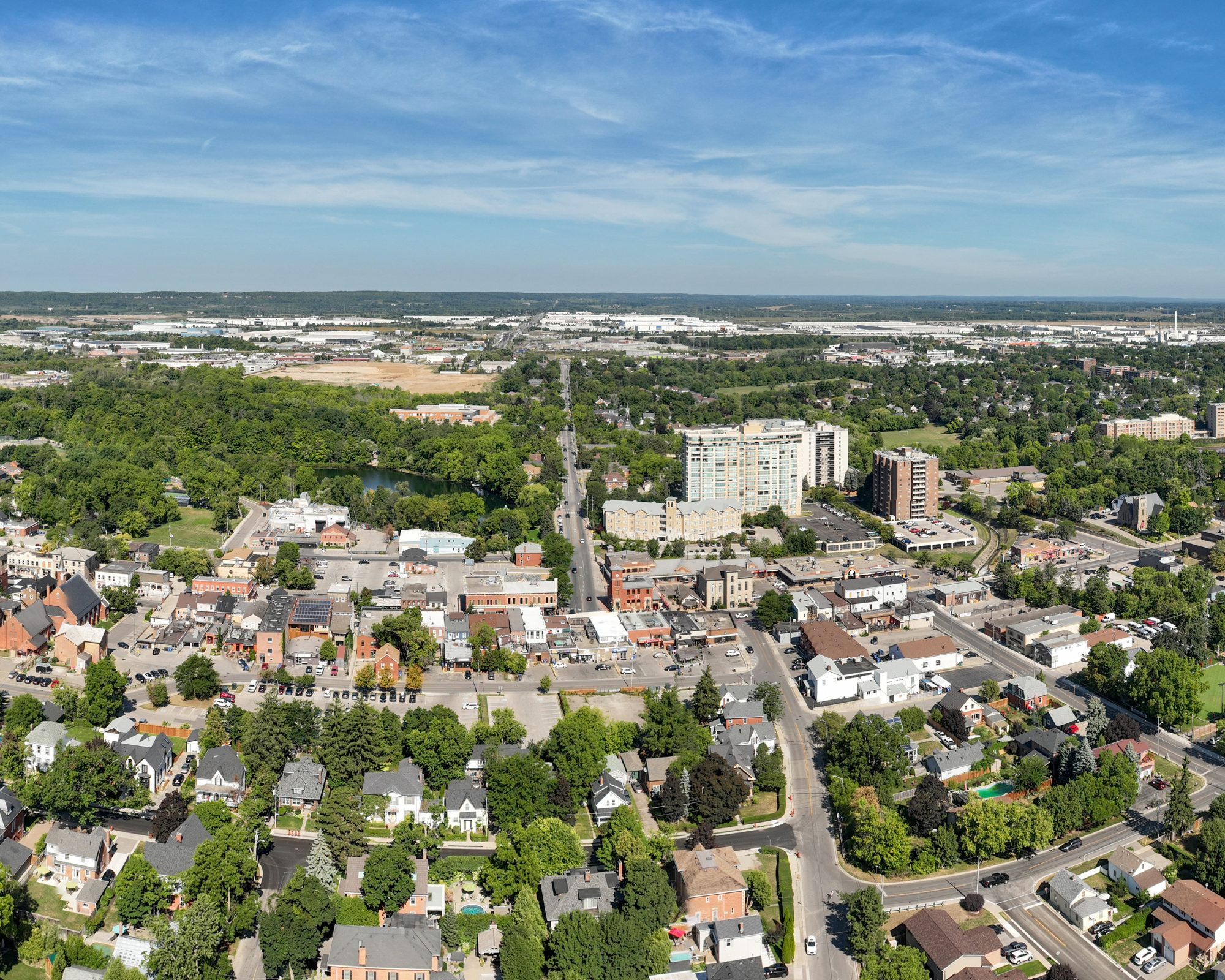 Aerial view of downtown Milton with buildings and greenery