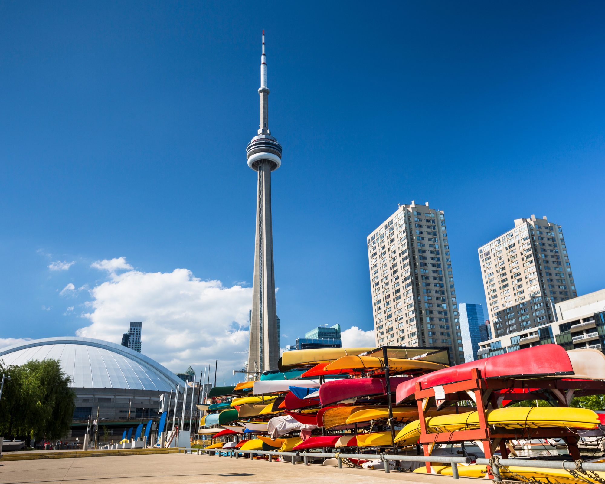 Aerial view of downtown Toronto with the Rogers Centre and boats on a rack